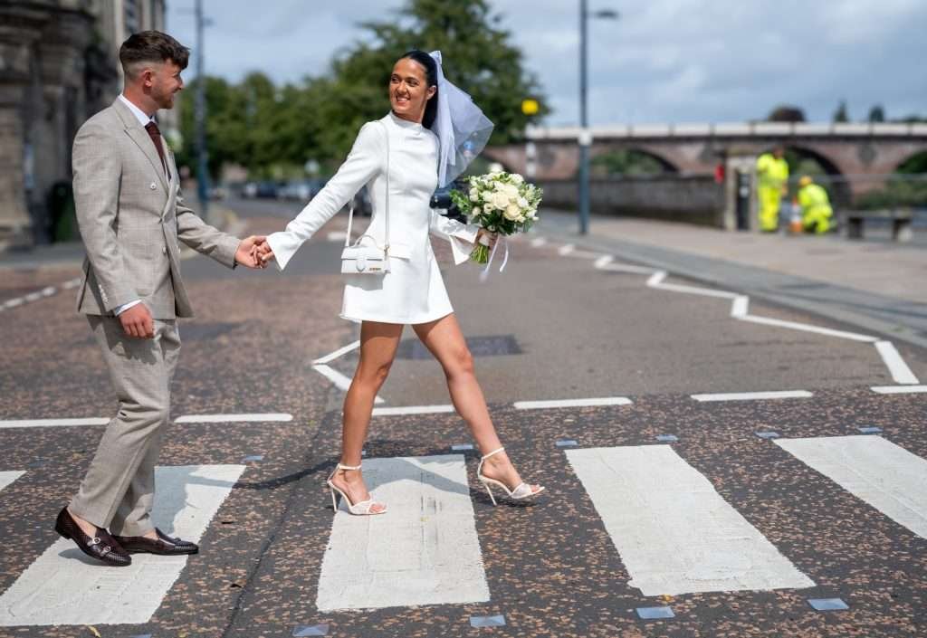 Bride and Groom on zebra crossing